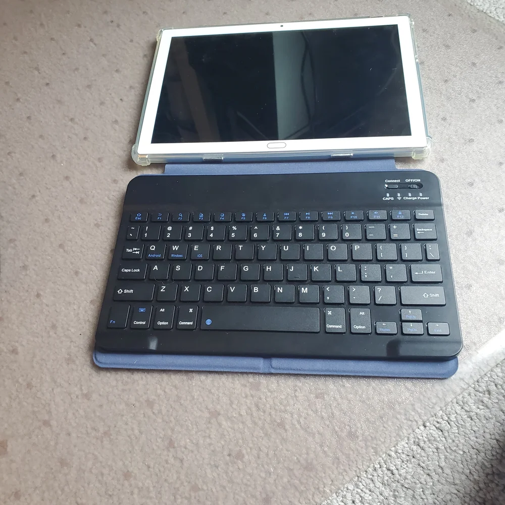 This is a Meiza Andriod Tablet with Black Keyboard